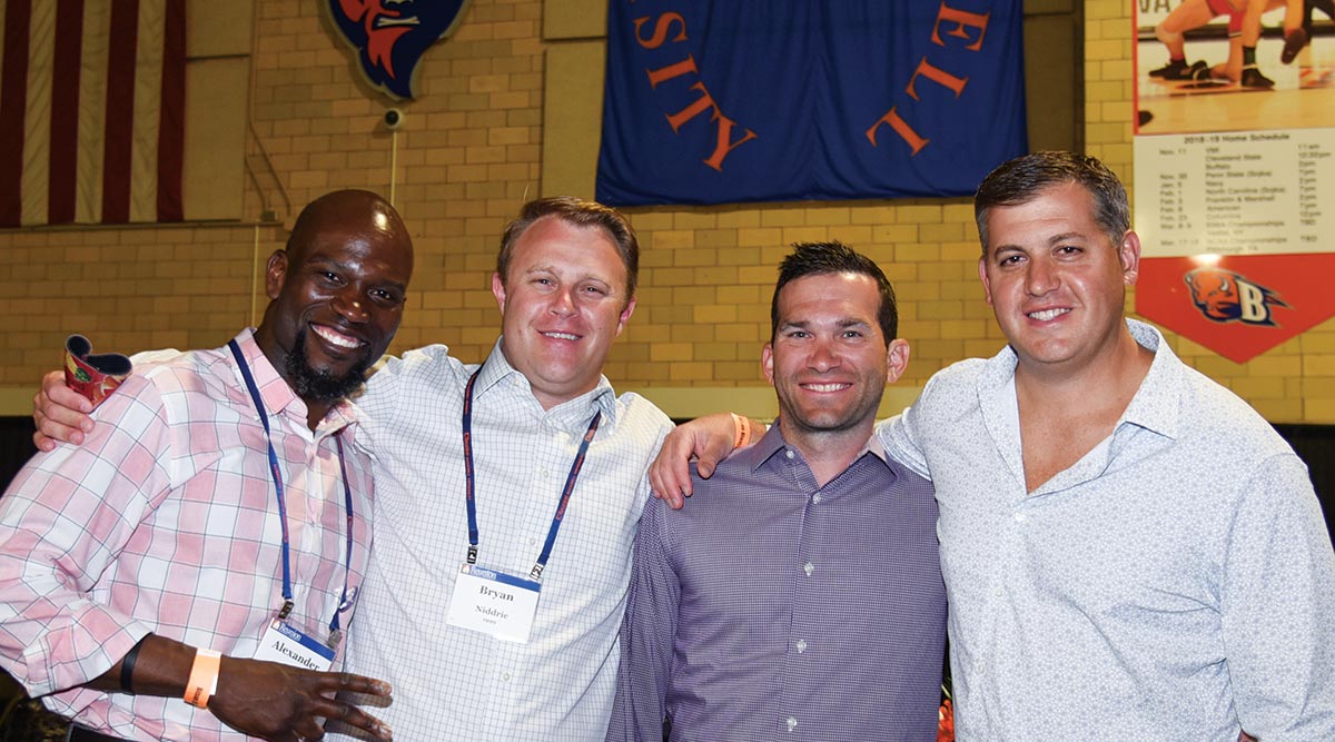 Fellow winners enjoying the Alumni Awards reception.