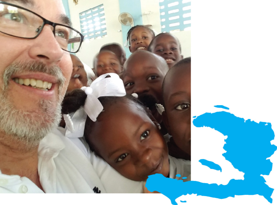 Steve Durfee meeting children in Haiti