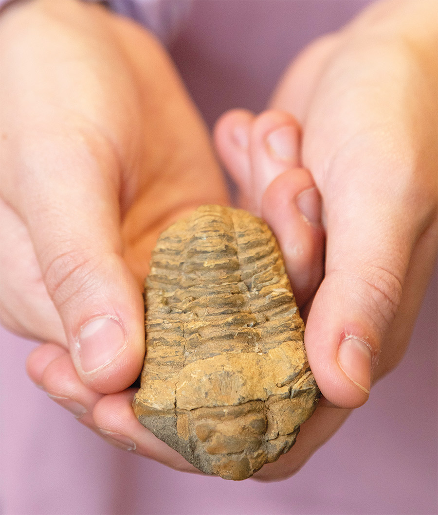 Ali Reach shows her fossils that her high-school science teacher gave her