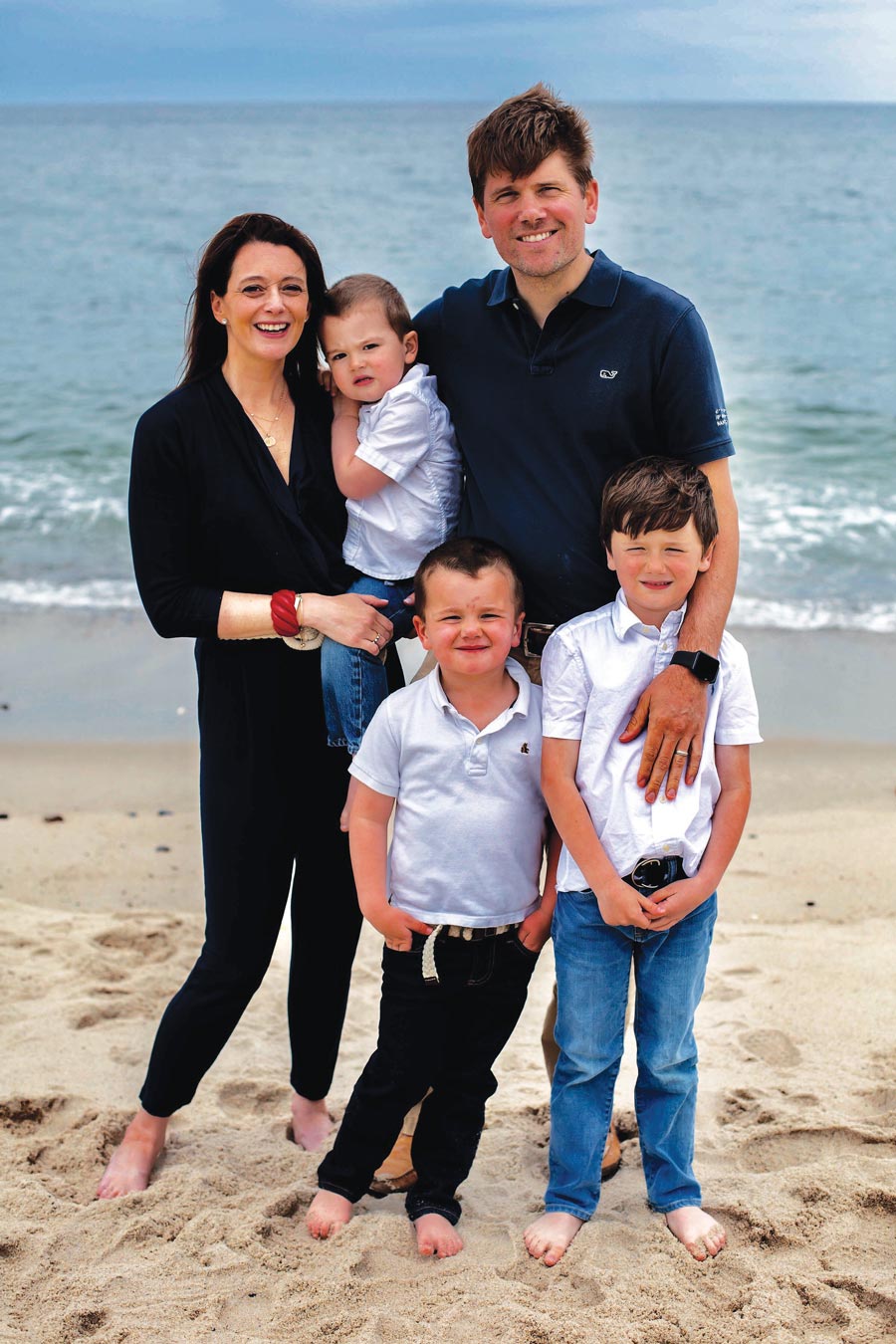 Matt '01 and Kate Foy Cole '03 and their three kids at the beach