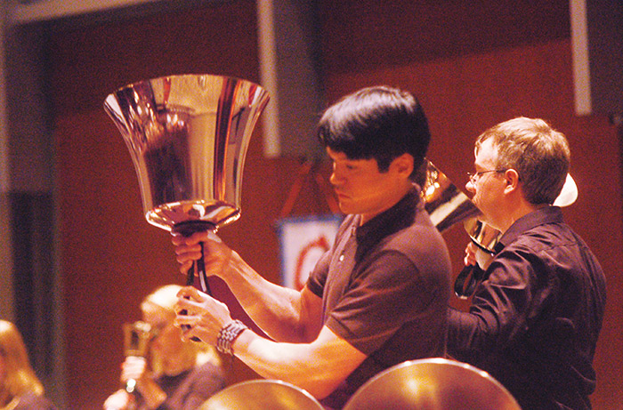 An alumni who performing bells
