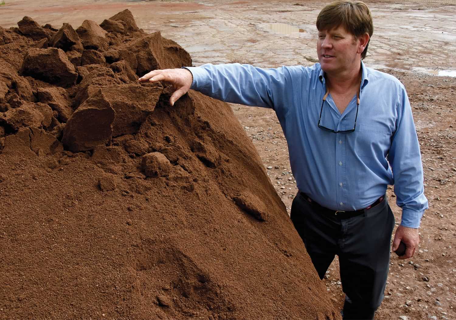 Grant McKnight surveying his red-clay mix at his Grove City, Pa. facility