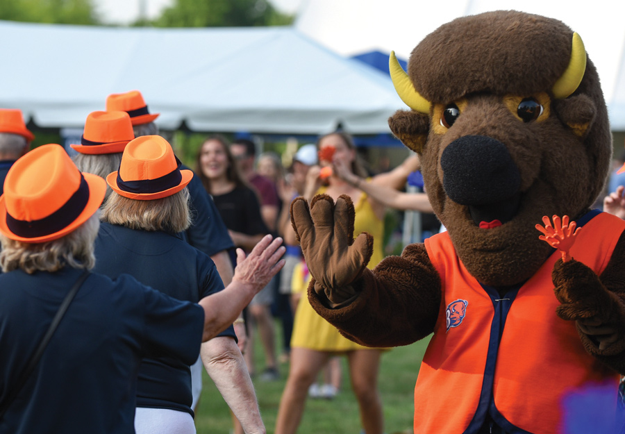 Mascot Giving Out High Fives at The Reunion Weekend Event