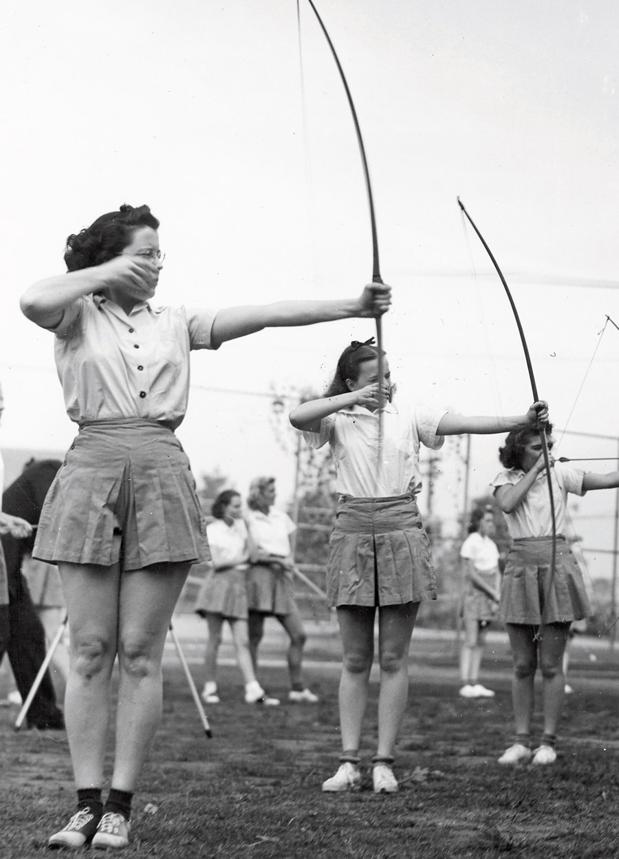 Women using bow and arrows