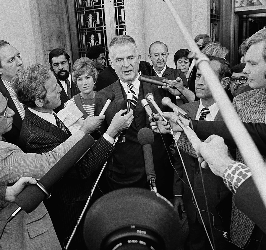 Special Watergate prosecutor Archibald Cox surrounded by journalists on Oct. 19, 1973
