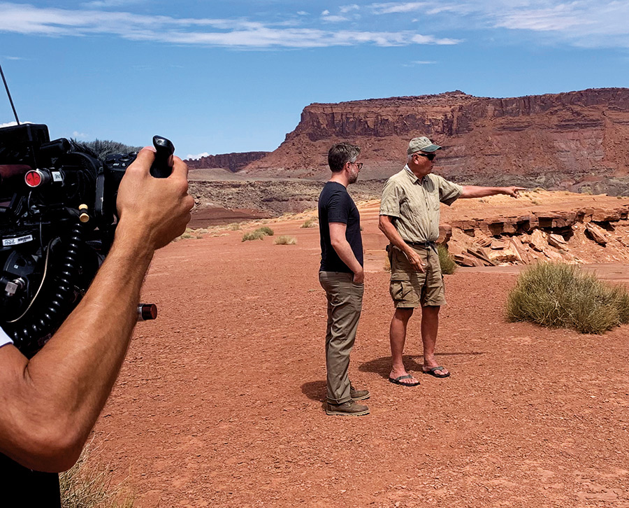 Jack Schmidt working with a film crew from Vice News at the Lake Powell reservoir