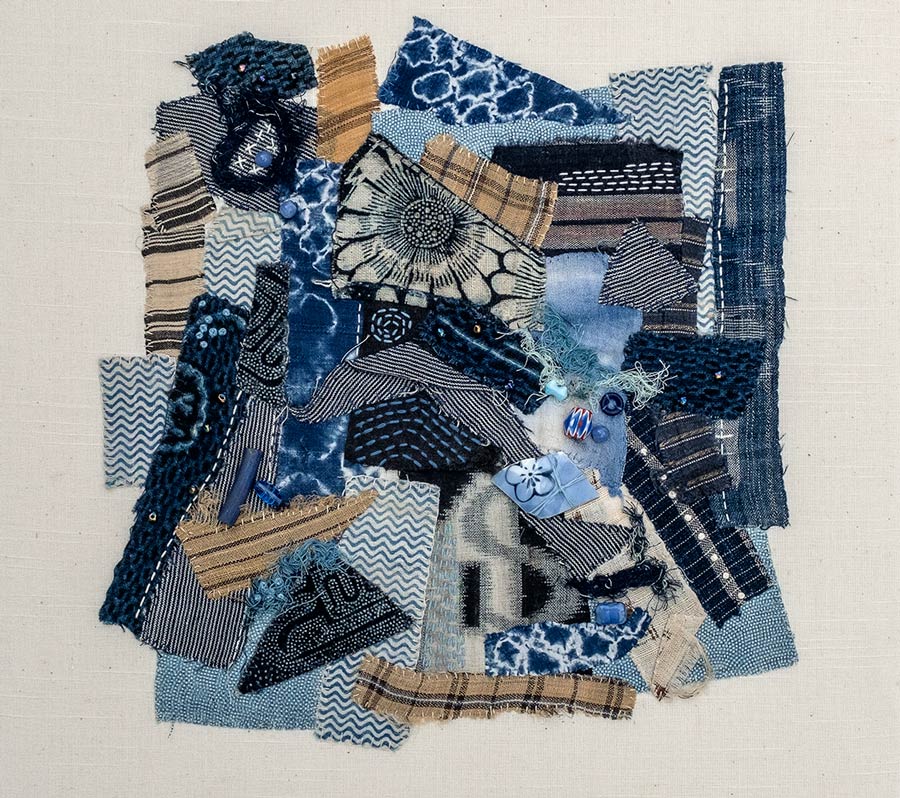 a hand-stitched fiber collage