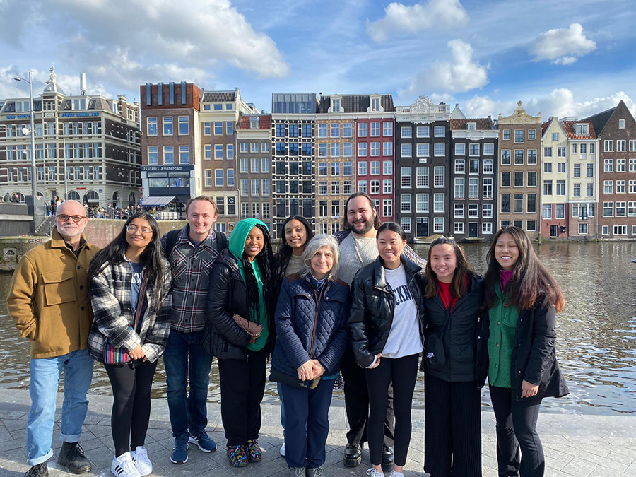 group of students smiling in Amsterdam