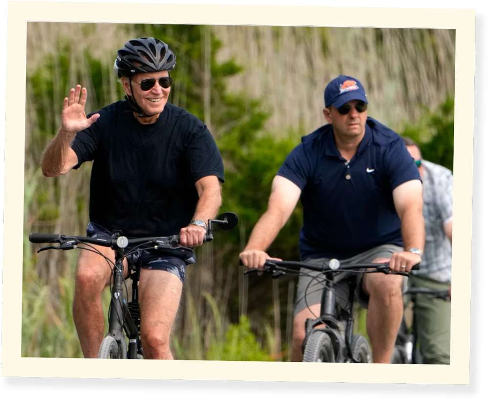 Darryl Volpicelli (right) accompanies President Joe Biden on a bike ride in Delaware