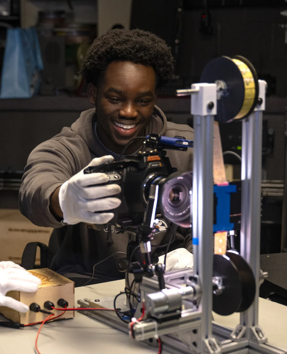 John Ogunwomoju working with a camera